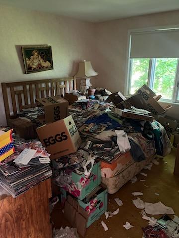 messy home before hoarding cleanout service