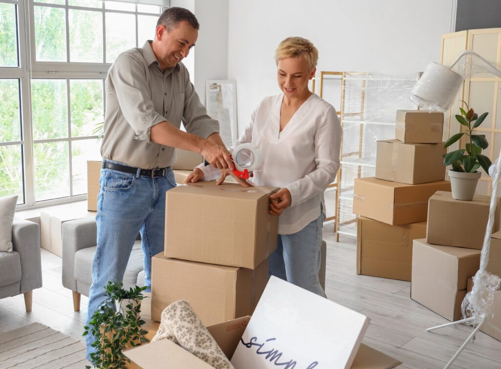 older couple packing up boxes during their move