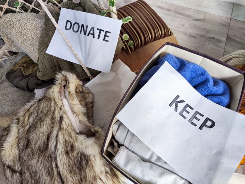 a donate and keep pile to help declutter a mess